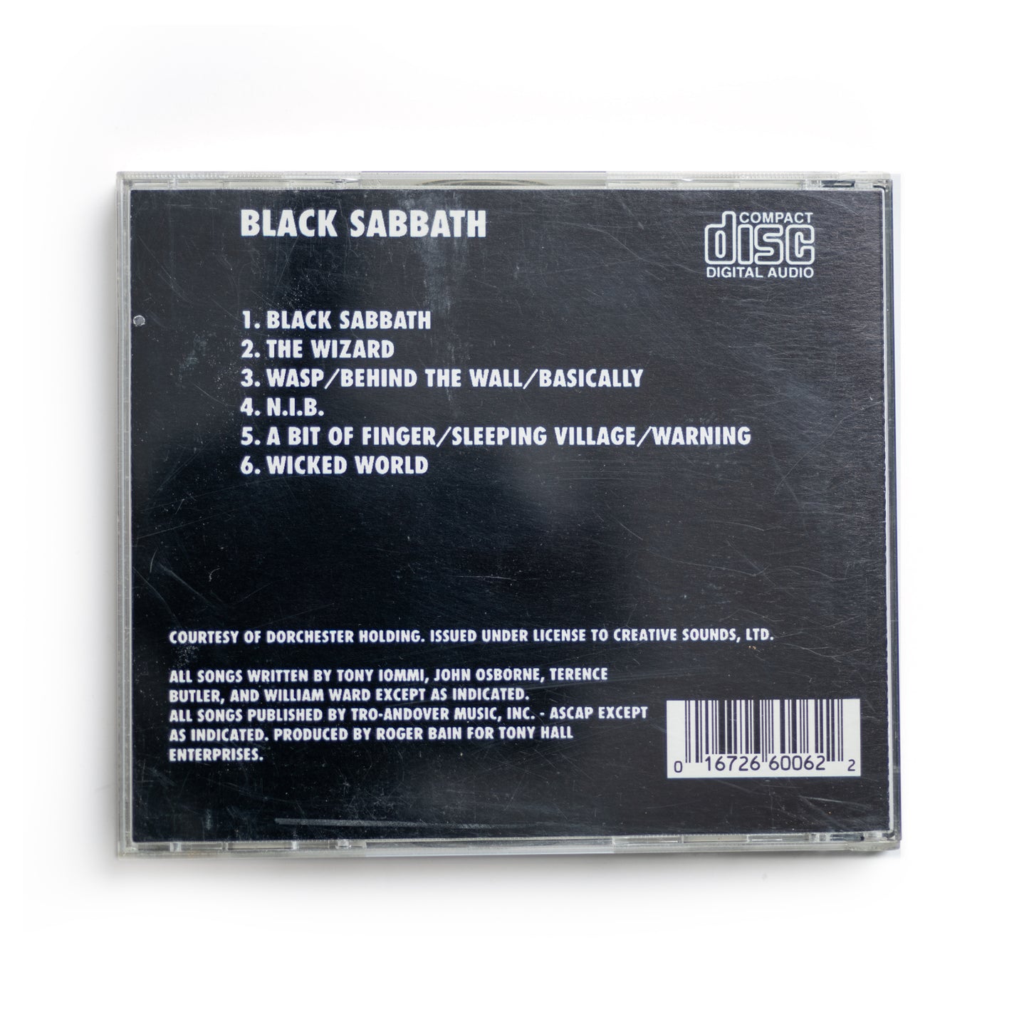 Back cover of Black Sabbath 1970 debut CD showing tracklist including 'Black Sabbath,' 'The Wizard,' and 'N.I.B.,' early heavy metal classic, Warner Bros. or Vertigo Records edition, dark aesthetic, British rock legends.