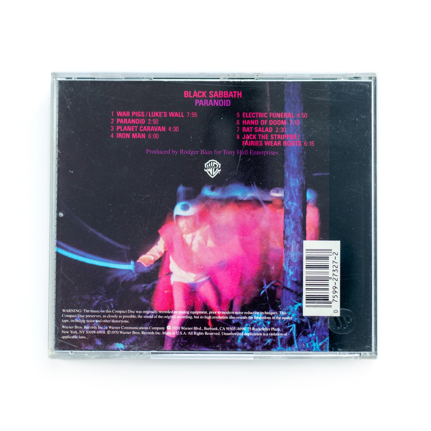 Back cover of Black Sabbath Paranoid CD showing full tracklist including 'Paranoid,' 'Iron Man,' 'War Pigs,' and 'Fairies Wear Boots,' 1970 heavy metal masterpiece by Ozzy Osbourne and Tony Iommi, Warner Bros. / Vertigo edition.