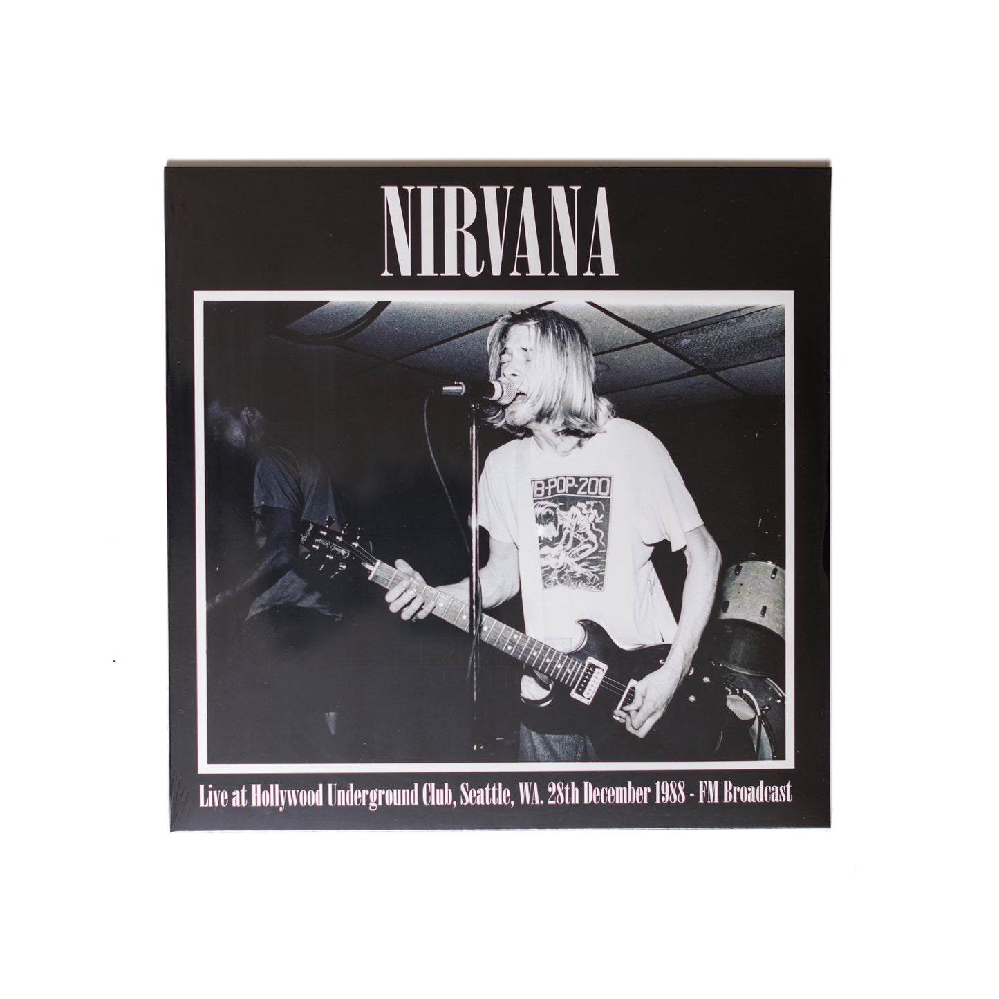 Nirvana Live at Hollywood Underground Club LP front cover with vintage concert photo of Kurt Cobain mid-performance.