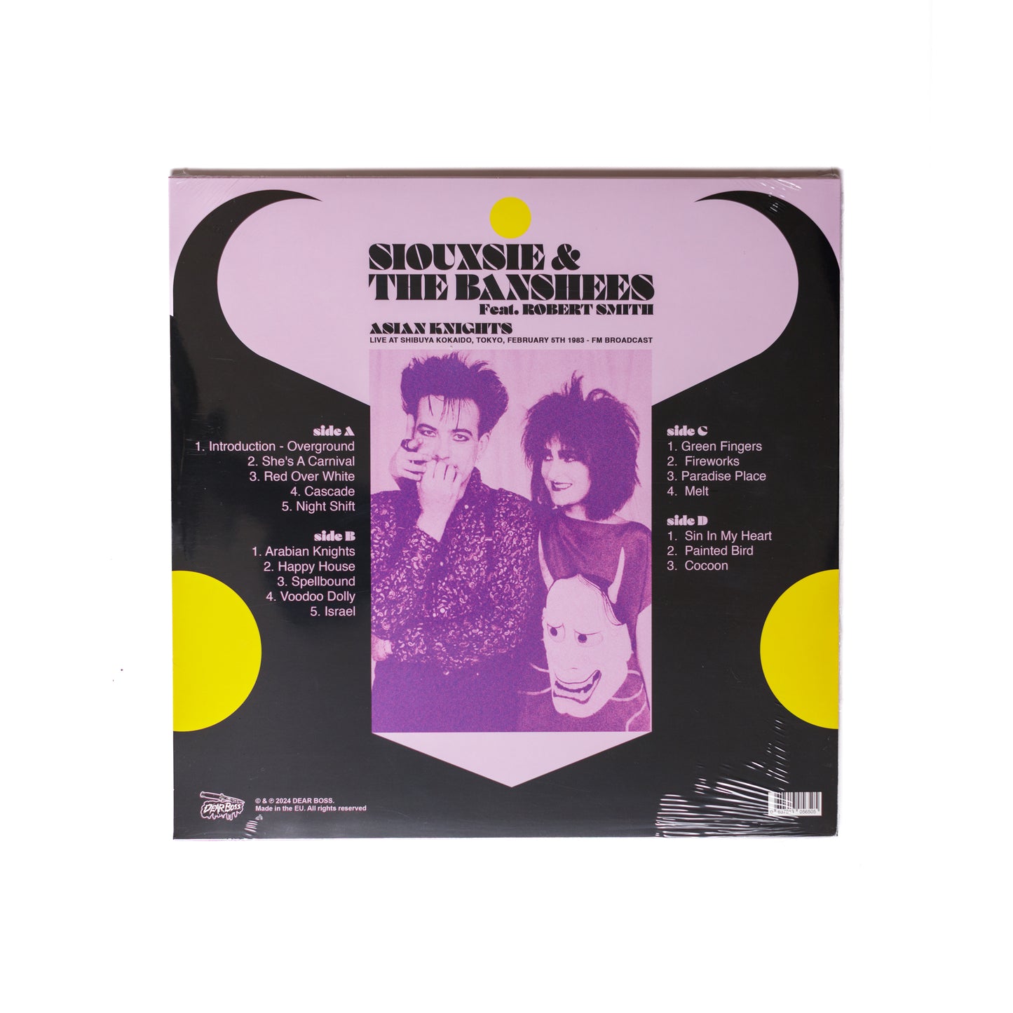 Back cover of Asian Knights Live in Tokyo LP showing tracklist, band credits, and performance details with a minimalist, 80s-inspired design.