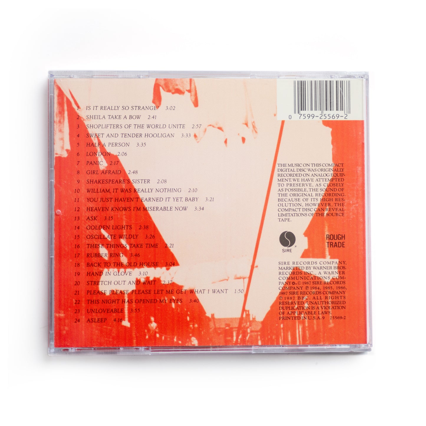Back cover of The Smiths Louder Than Bombs CD showing full tracklist in black type on orange background, 1987 compilation album featuring hits like 'Panic,' 'Ask,' and 'Shoplifters of the World Unite,' Rough Trade Records release, alternative rock, post-punk UK band.