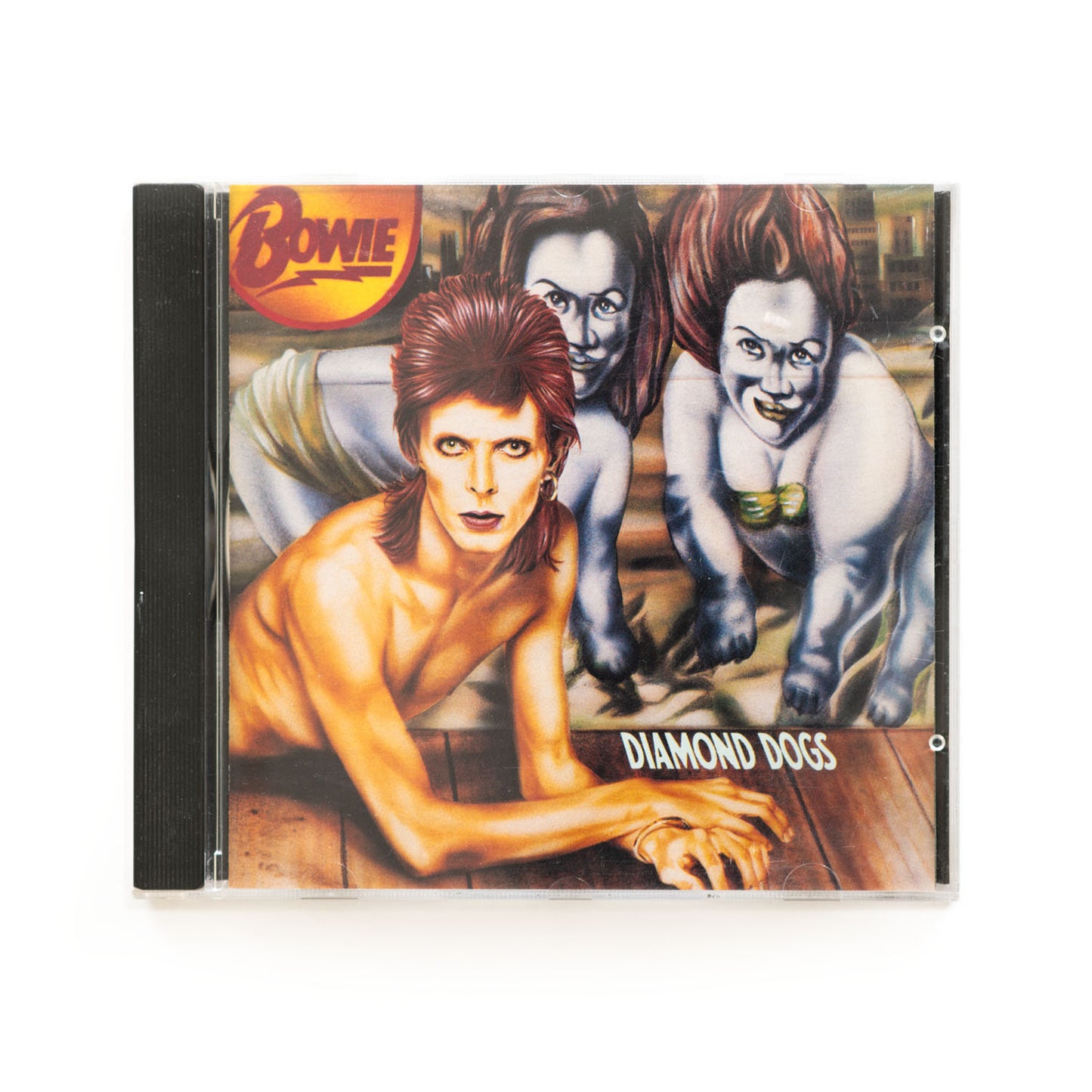 David Bowie Diamond Dogs CD cover featuring an illustration of the artist with Bowie in a stylized lightning bolt design in the top left.