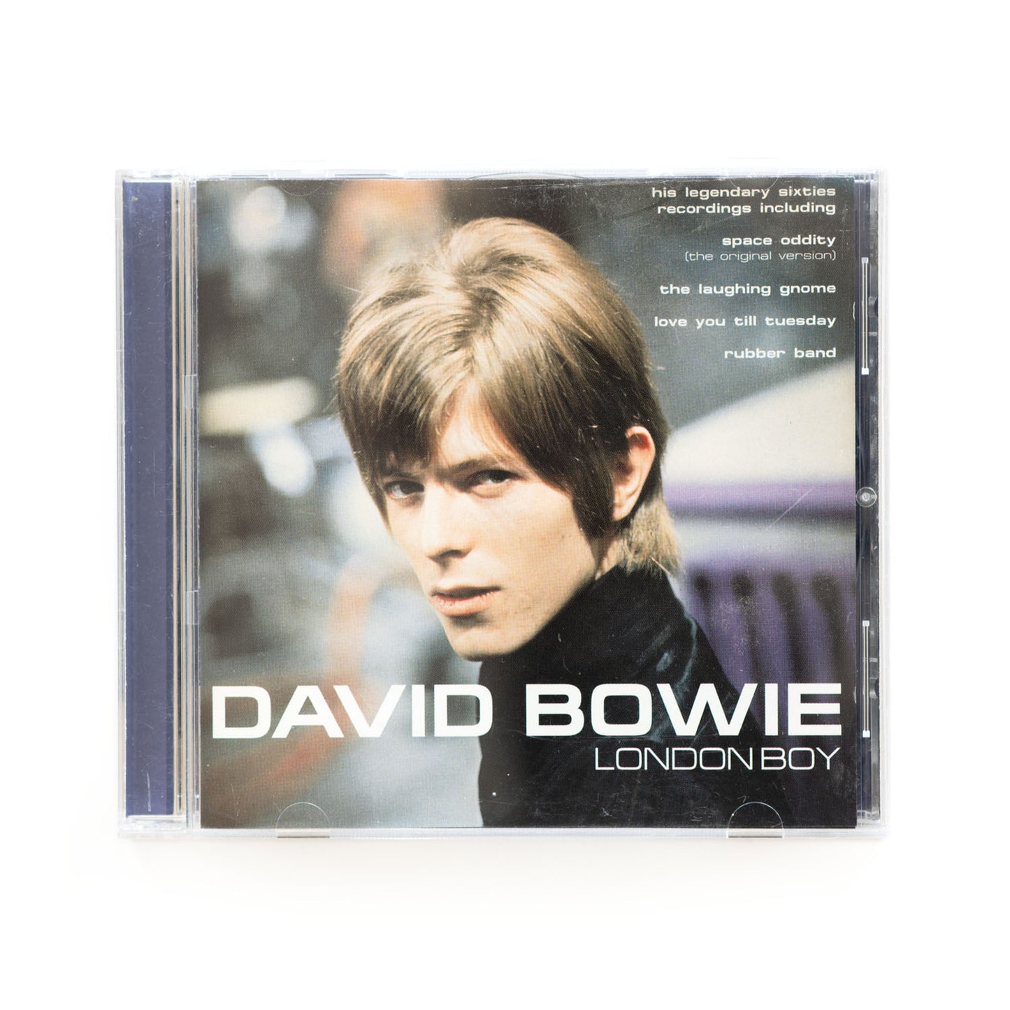Cover of David Bowie London Boy CD featuring a photo of a young David Bowie. Text reads: his legendary sixties recordings including Space Oddity, The Laughing Gnome, Love You Till Tuesday,and Rubber Band.