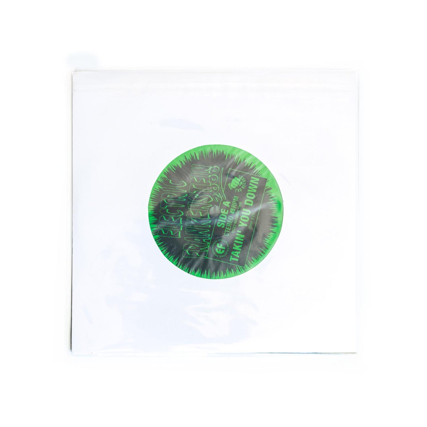 Round green and black sticker on a white background. Electric Frankenstein.