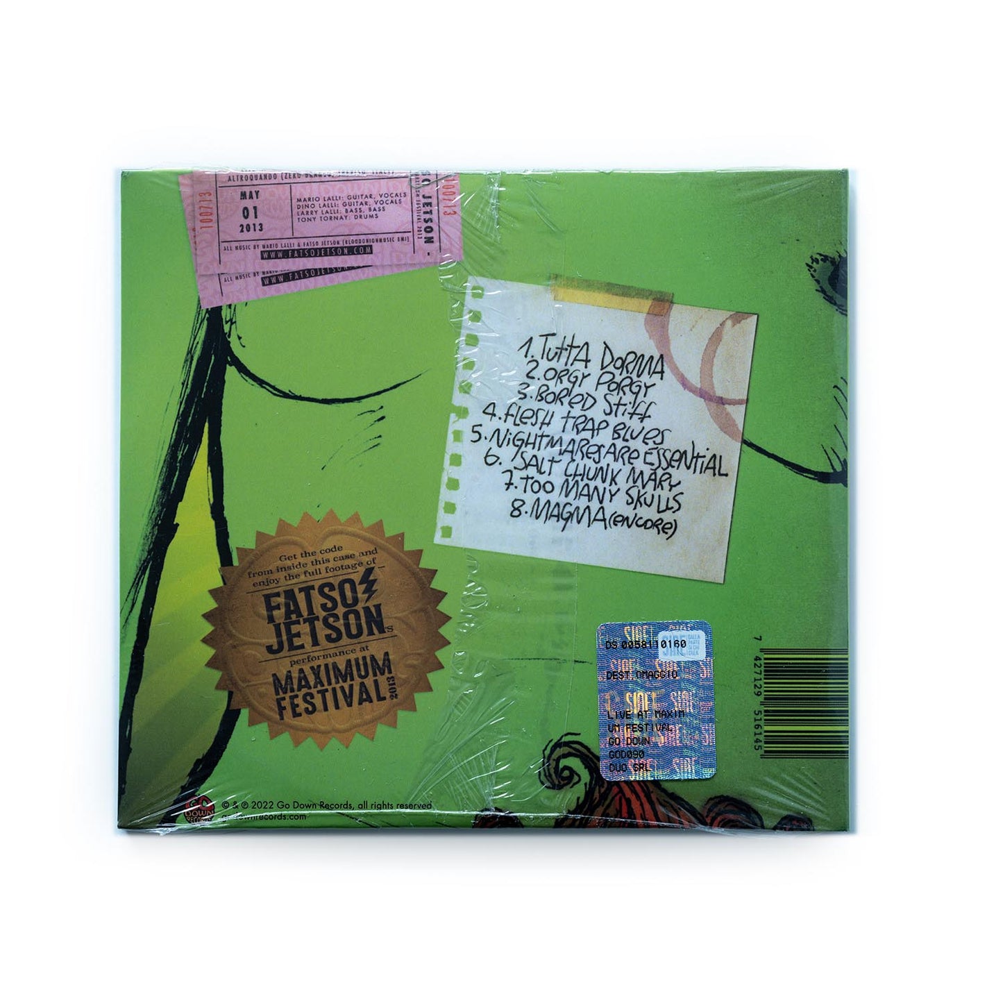 Back cover of Fatso Jetson – Live at Maximum Festival CD displaying live tracklist, performance credits, and festival details; design includes stage photo elements and rugged textures reflecting the band’s powerful, experimental rock sound.