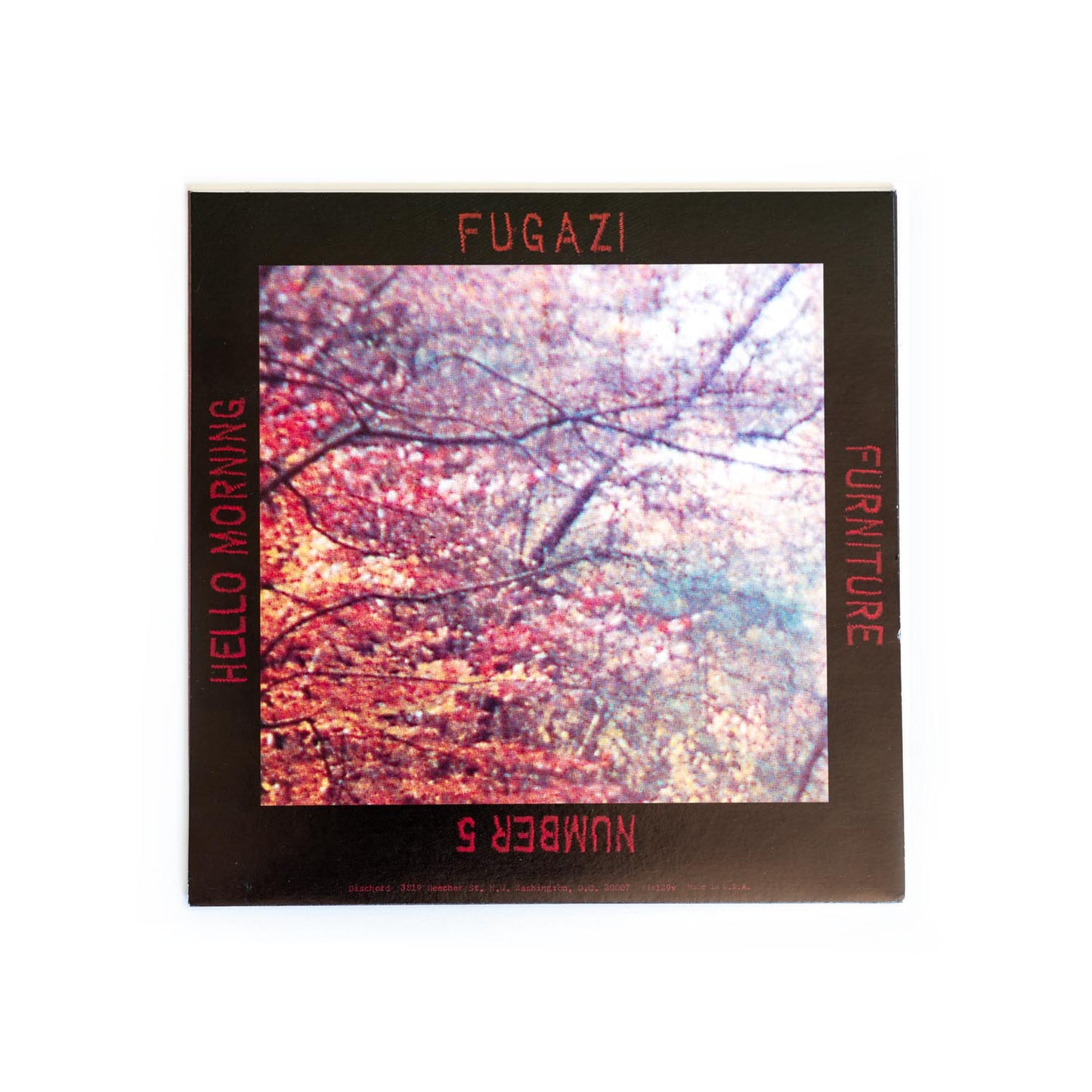 Album cover with tree design and text 'Fugazi', 'Hello Morning', 'Furniture', 'Number 5' on a black background