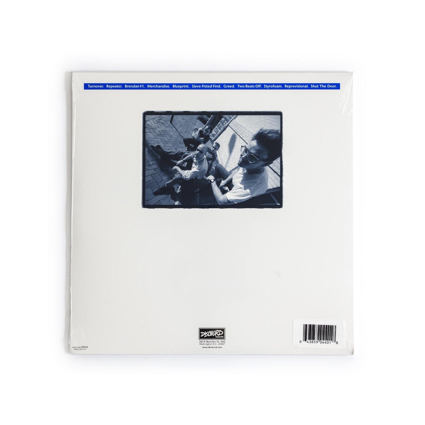 Fugazi Repeater back cover of vinyl LP with black-and-white band photo by Glen E. Friedman and tracklist layout.