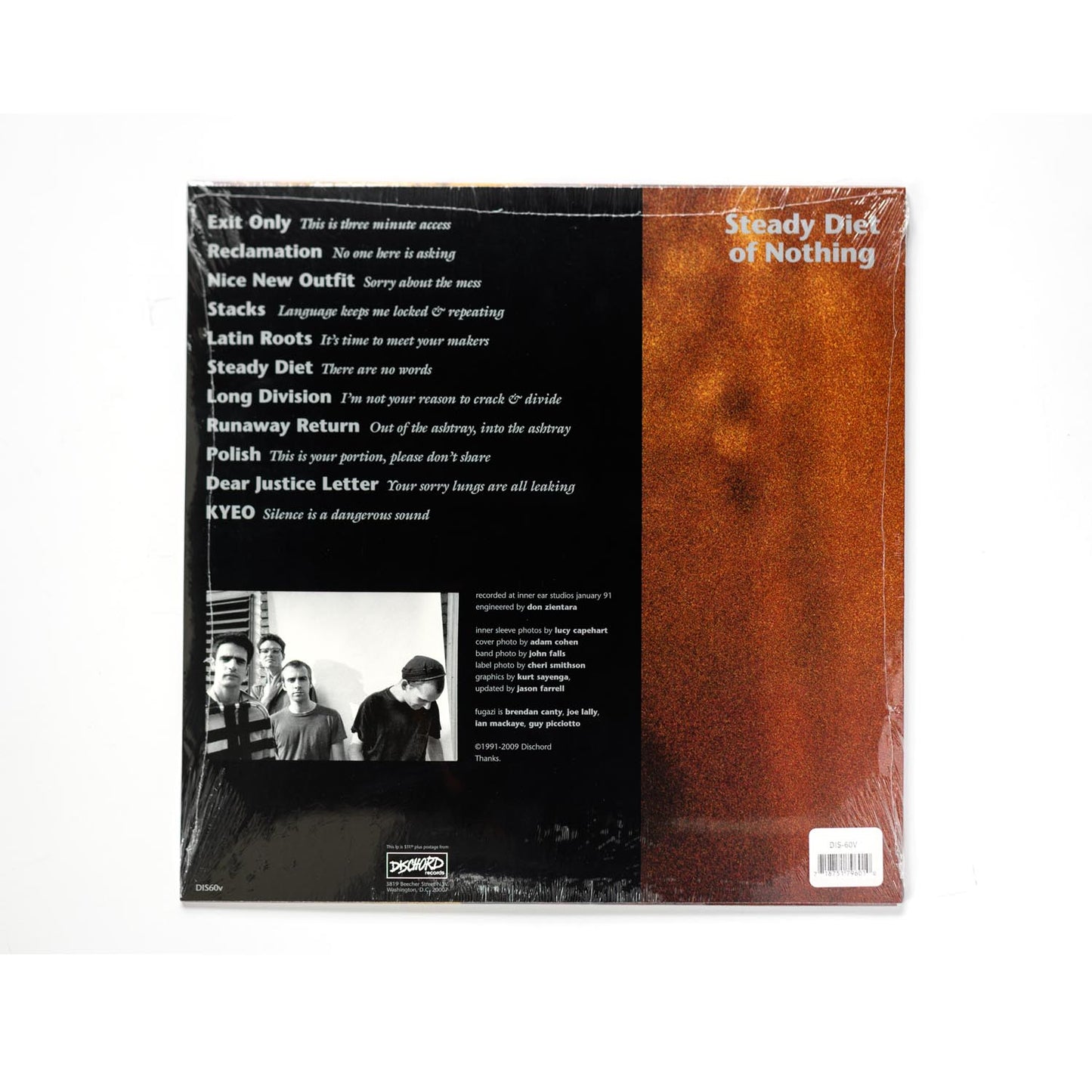Back cover of Fugazi – Steady Diet of Nothing LP showing full tracklist, remaster credits, and inner sleeve photography from the 2012 Dischord Records vinyl repress