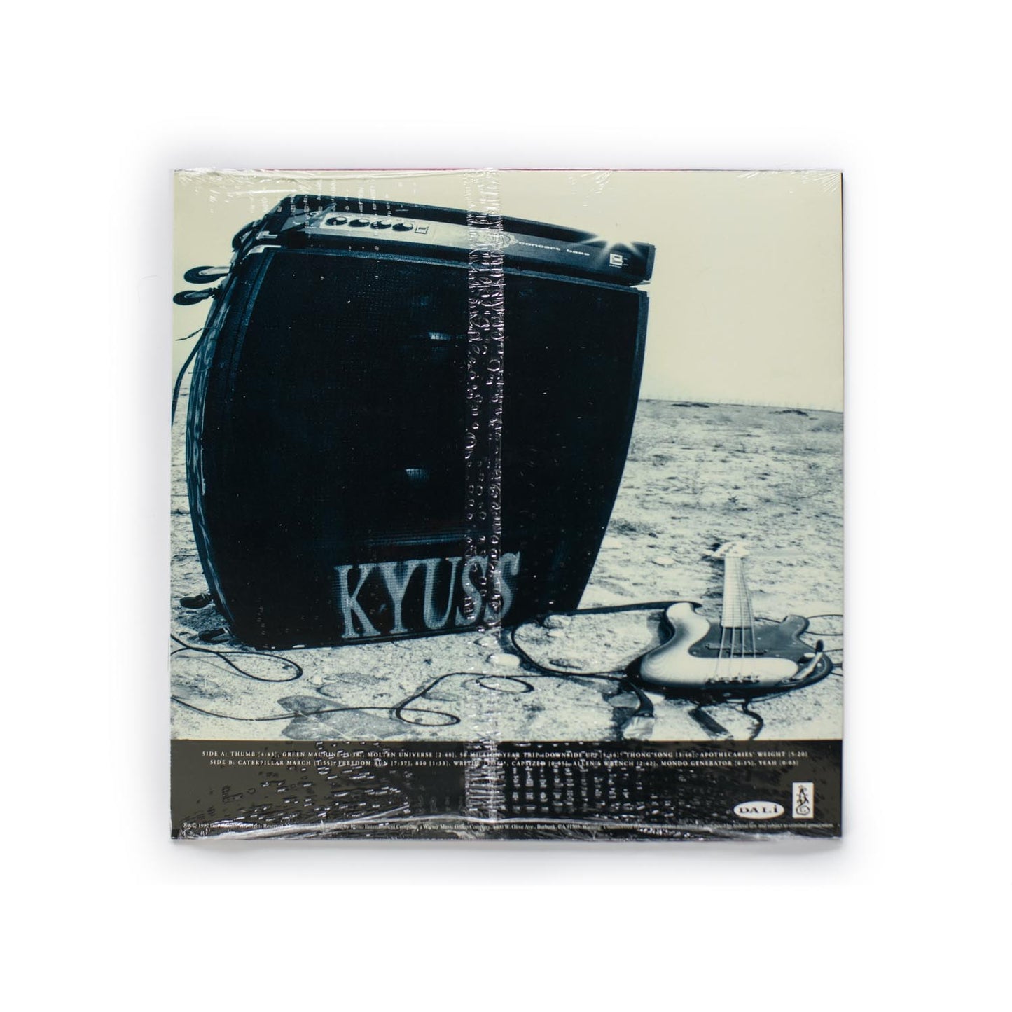 Back cover of Kyuss Blues For The Red Sun vinyl LP featuring tracklist, band credits, solar observatory photo, and design credits.