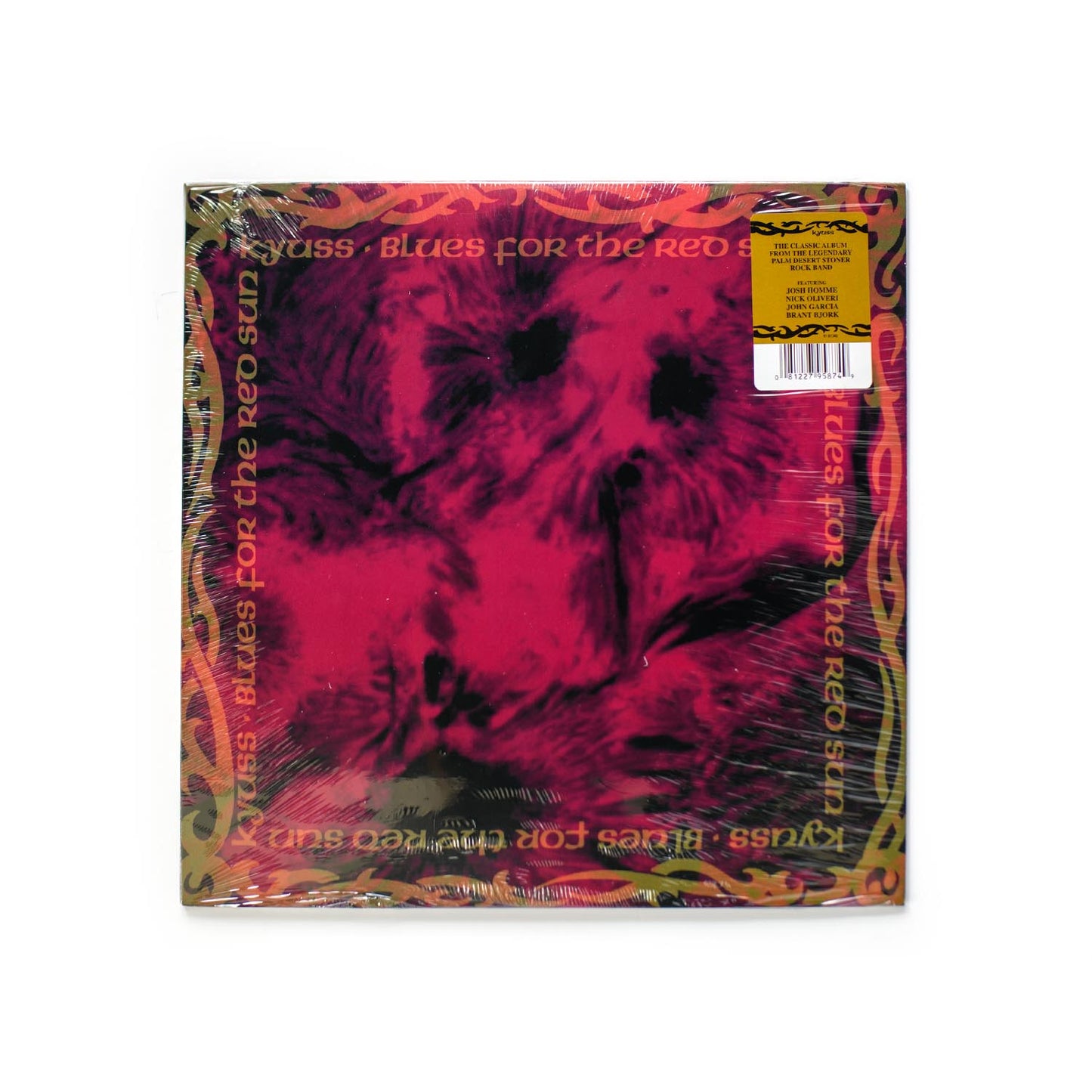 Kyuss Blues For The Red Sun front cover with red and black abstract solar imagery, bold stylized band logo at the top.