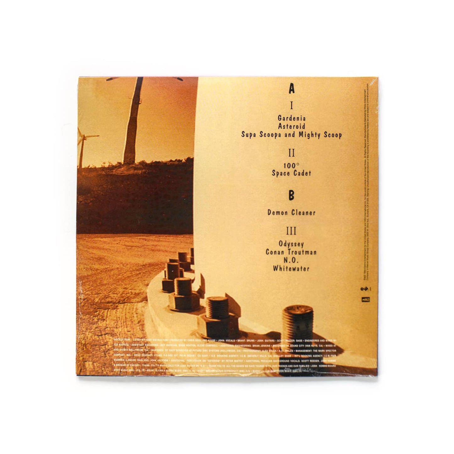 Back cover of Welcome To Sky Valley showing tracklist and credits in minimalist layout over a black background.