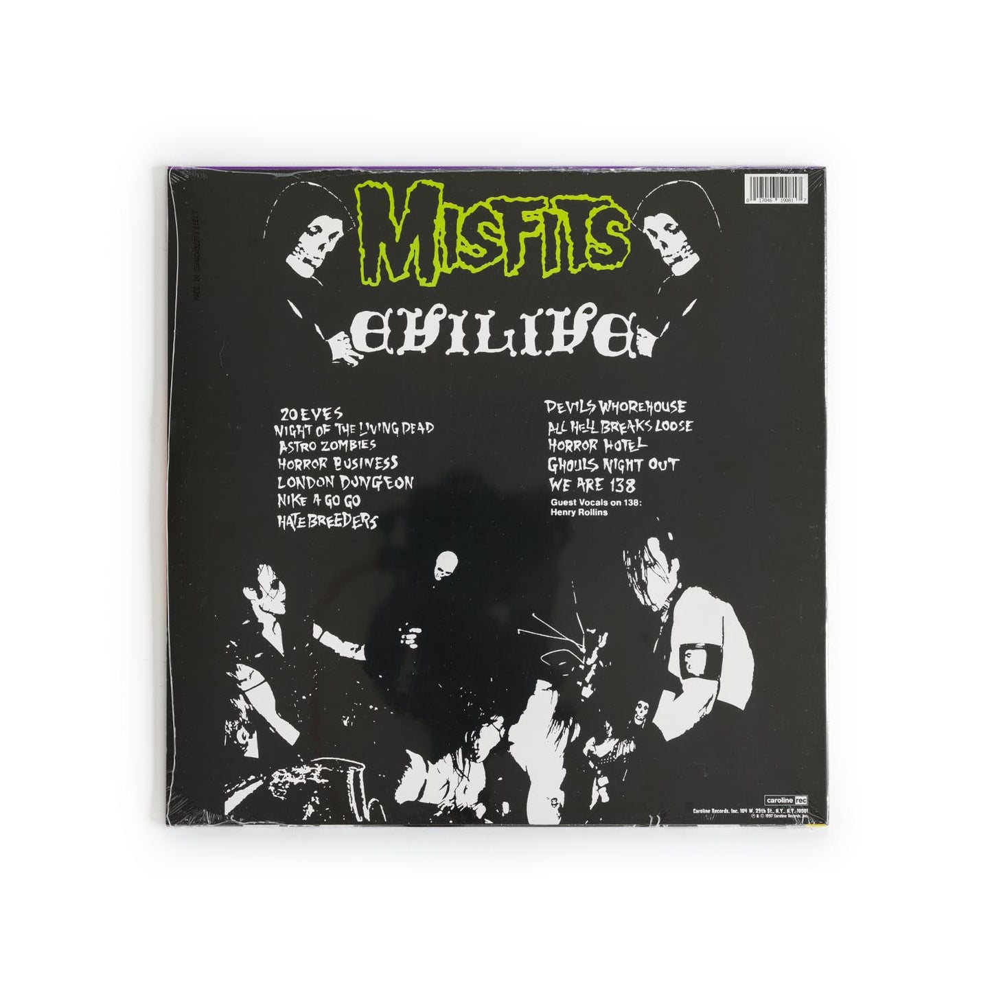 Back cover of Evilive by the Misfits, showing live concert photos, tracklist, and original Plan 9 / Caroline Records logos. Classic hardcore punk collectible from 1987.
