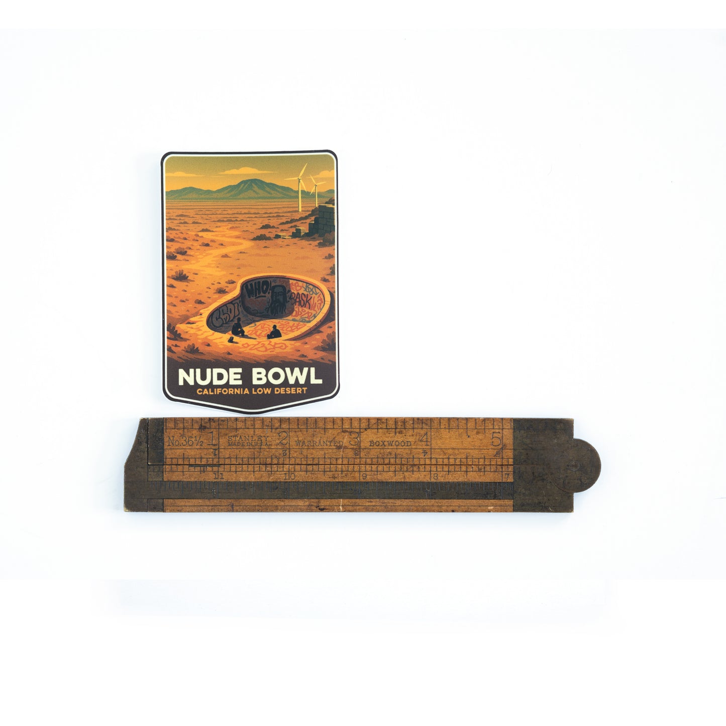 Sticker with an illustration of the iconic skateboard spot done in the style of a National Park sticker. Shown with a ruler for scale.