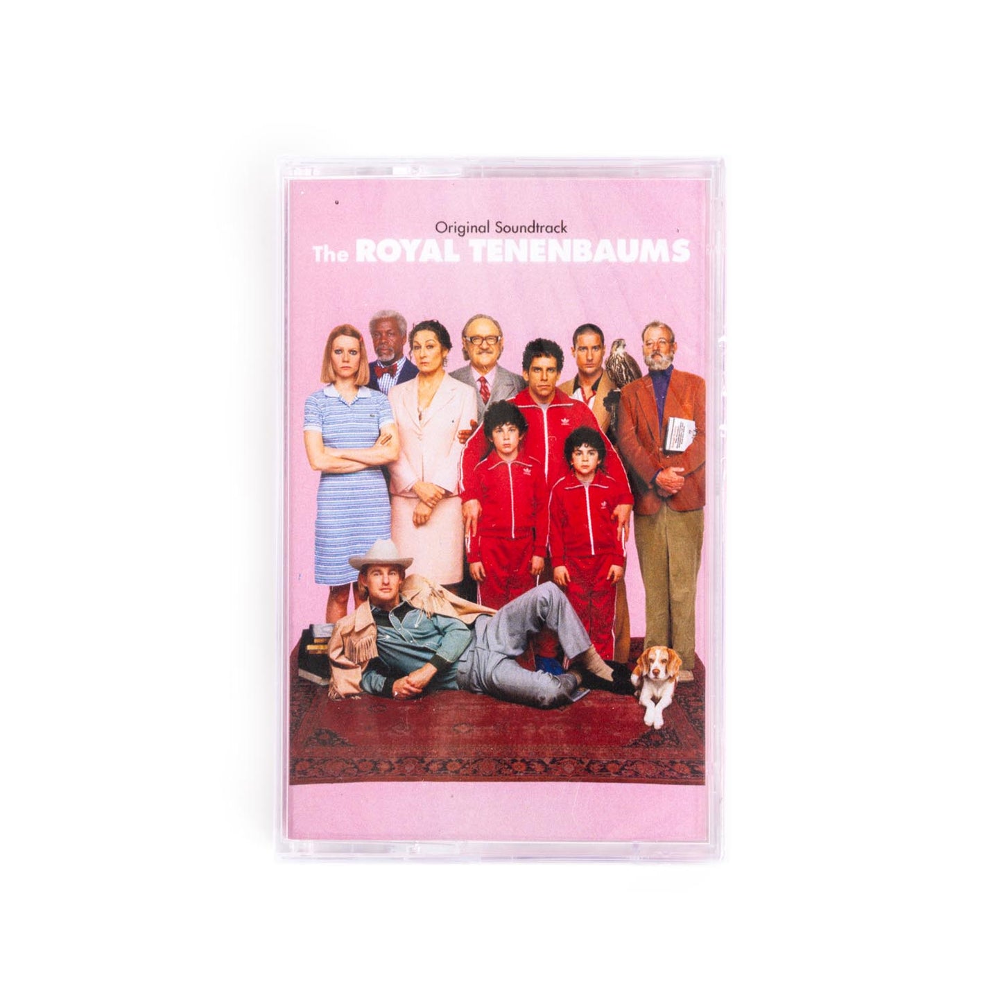 Cover of the Royal Tennenbaums cassette featuring a portrait of the actors from the film against a pink background.