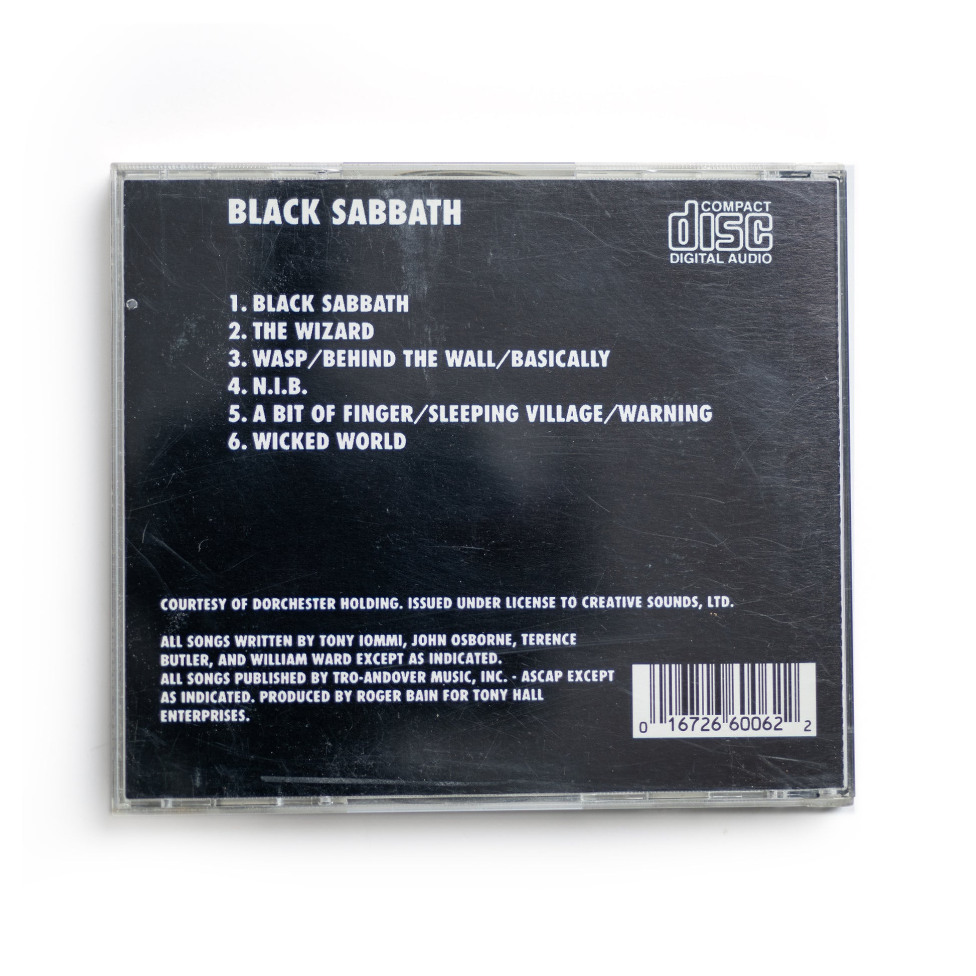 Back cover of Black Sabbath 1970 debut CD showing tracklist including 'Black Sabbath,' 'The Wizard,' and 'N.I.B.,' early heavy metal classic, Warner Bros. or Vertigo Records edition, dark aesthetic, British rock legends.