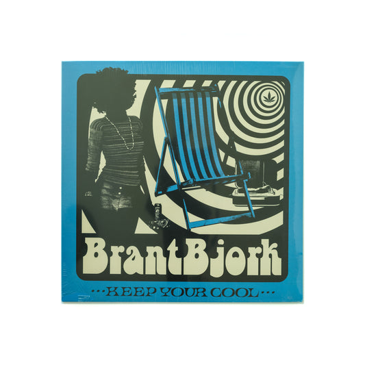 Front cover of Brant Bjork – Keep Your Cool vinyl LP reissue from Heavy Psych Sounds, featuring new retro-style artwork with bold typography and a vintage color palette—capturing the laid-back swagger and groove of this desert rock classic.