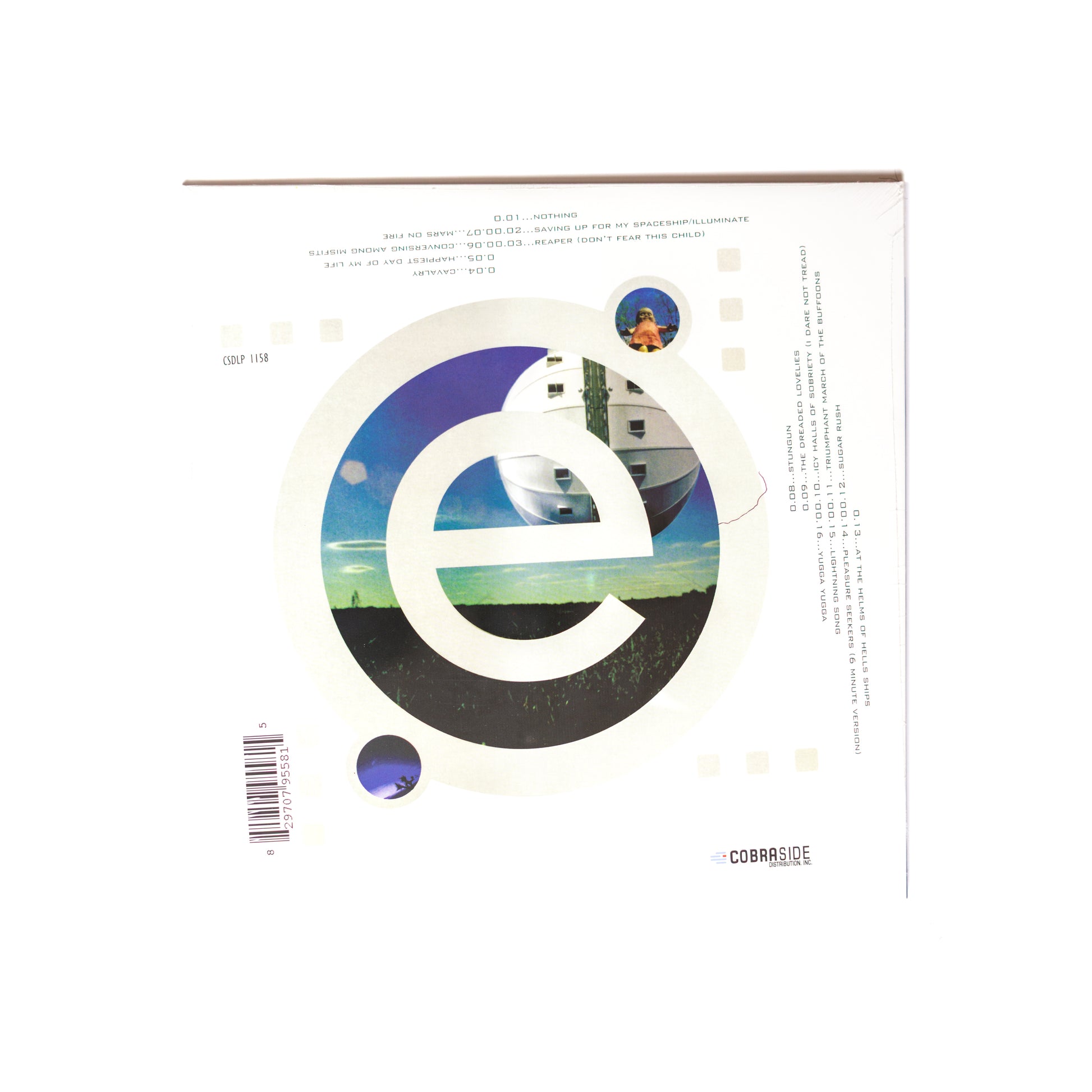 Back cover of Earthlings? LP with tracklist, band photo, and credits set against a starry night desert landscape.