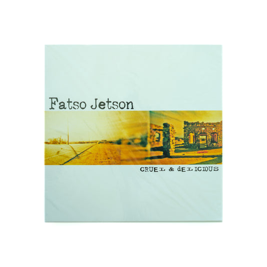 Front cover of Fatso Jetson – Cruel and Delicious vinyl LP reissue from Lonestar Records, featuring a surreal photograph of the low desert—capturing the band's experimental desert rock, surf punk, and psychedelic fusion.