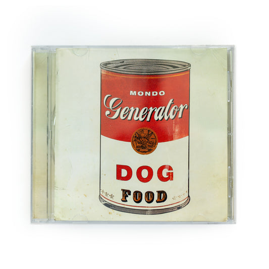 Front cover of Mondo Generator Dog Food CD featuring bold, stylized dog image in red and black, 2010 stoner rock album by Nick Oliveri, featuring tracks like 'Dog Food' and 'Green Machine.' 