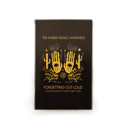 Front cover of Rubber Snake Charmers Forgetting Out Loud cassette featuring minimalist design with bold typography, limited edition release by Mario Lalli, Brant Bjork, and Sean Wheeler, blending lo-fi indie rock and experimental sounds.