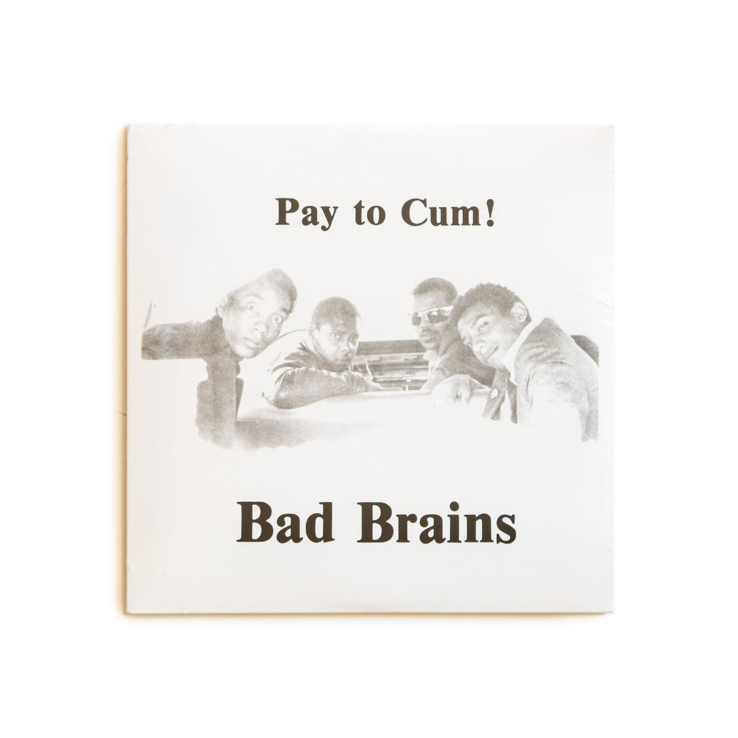 7 inch single cover of Bad Brains Pay to Cum! Featuring a black and white photo of the band. 