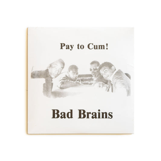 7 inch single cover of Bad Brains Pay to Cum! Featuring a black and white photo of the band. 