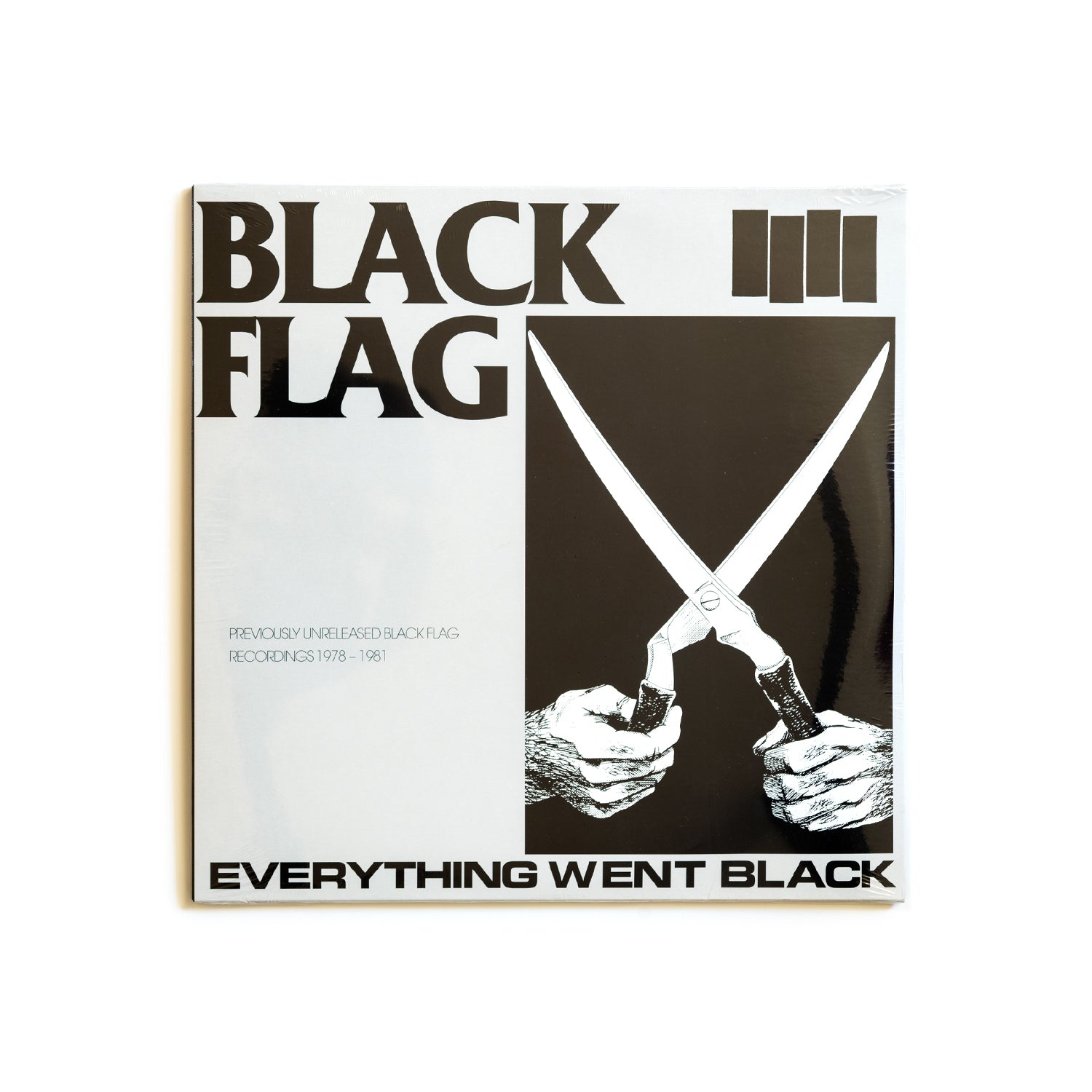 Black Flag album cover with crossed garden shears and text on a white background