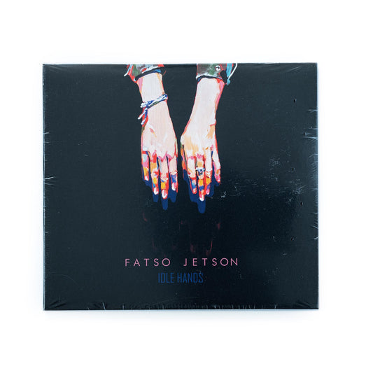 Fatso Jetson – Idle Hands CD front cover with surreal artwork, featuring skeletal hands, and vibrant psychedelic colors; bold album title and band name evoke the band’s signature desert rock and experimental punk sound.