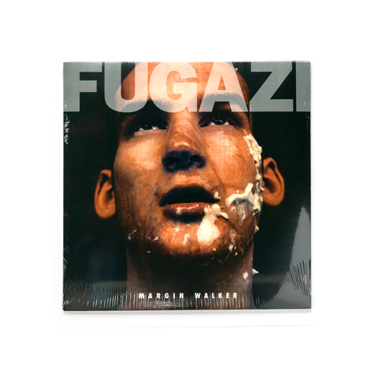 Fugazi – Margin Walker EP cover artwork, photo by Tomas Squip featuring stark portrait-style imagery with minimalist typography. Iconic visual aesthetic tied to the Washington D.C. post-hardcore scene. Remastered vinyl reissue from Dischord Records, 2009. Essential for punk, indie, and Fugazi fans.