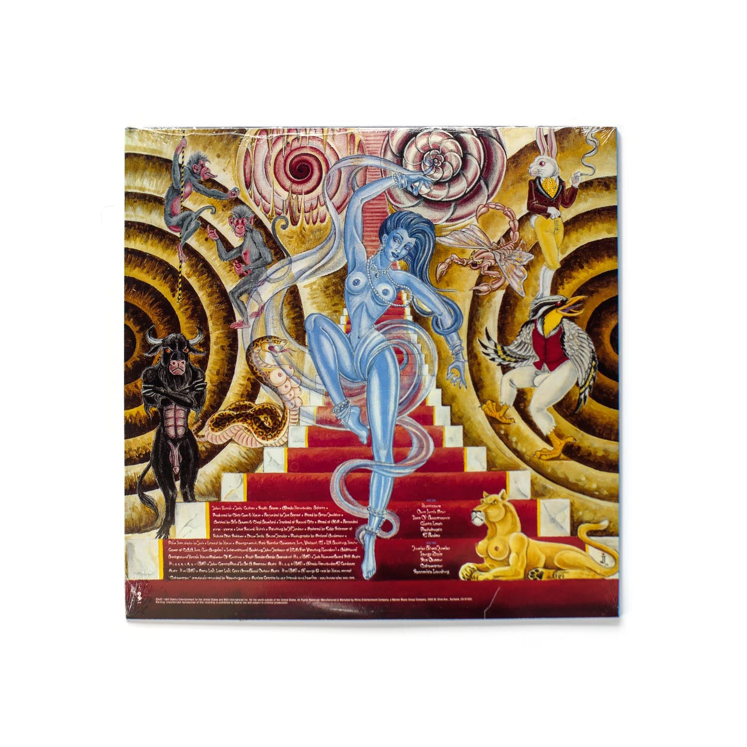 Back cover of ...And The Circus Leaves Town featuring tracklist, band credits, and a painting by Jill Jordan.
