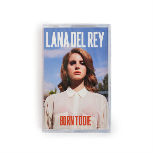 Front cover of Lana Del Rey Born to Die deluxe edition clear blue cassette tape. Features a portrait photograph of the artist with Lana Del Rey in bold white type at the top and Born To Die in a slightly smaller bold red type at the bottom. 