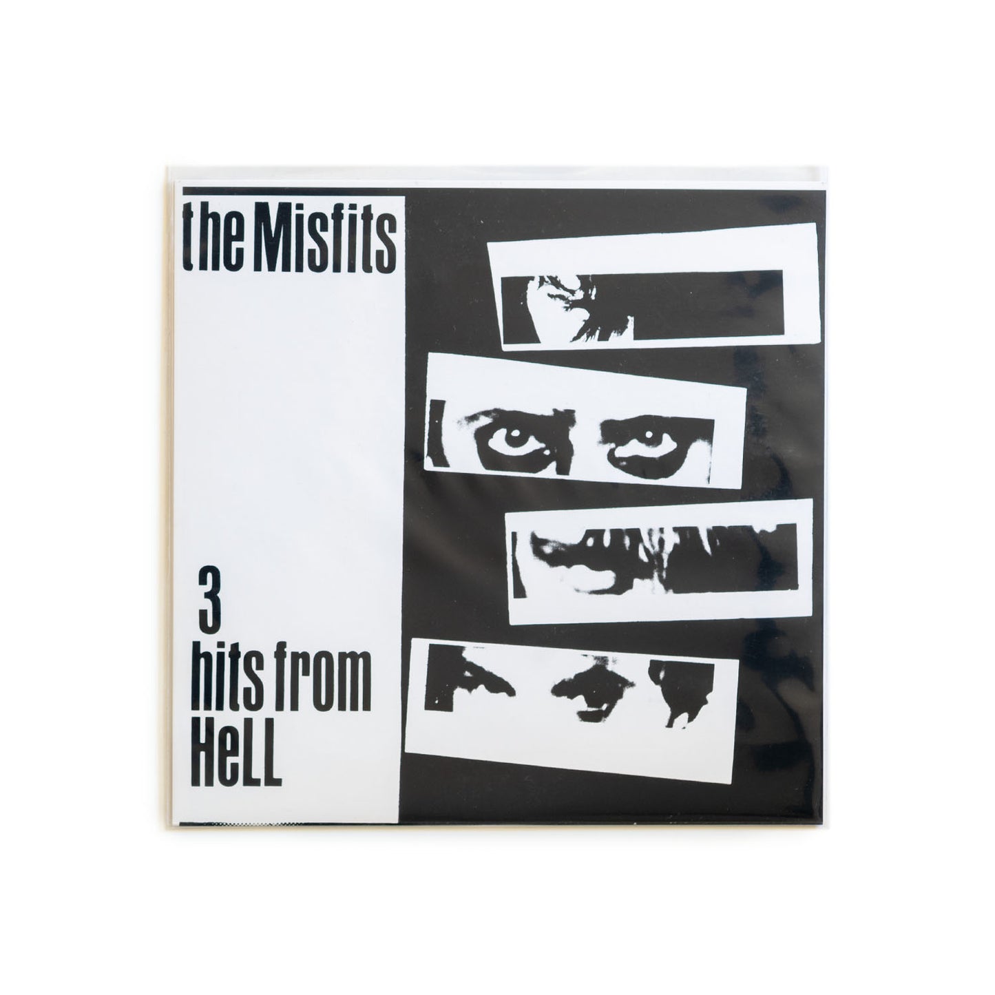 Album cover for '3 Hits from Hell' by The Misfits with black and white design.