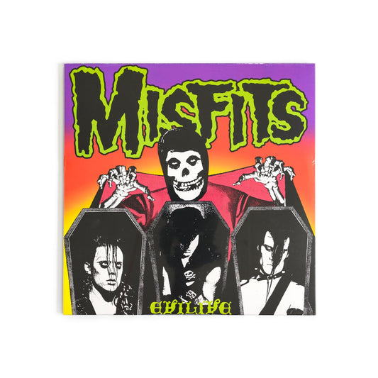 Misfits – Evilive album cover featuring black-and-white photos of the band in coffins, punk graphics with bold skeletal imagery and signature horror-punk aesthetics. An iconic live album from the Misfits.
