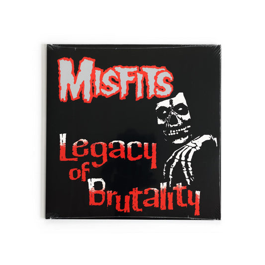 Misfits – Legacy of Brutality album cover featuring stark black-and-red typography with gothic, horror-inspired styling. Classic punk compilation with vintage DIY artwork.