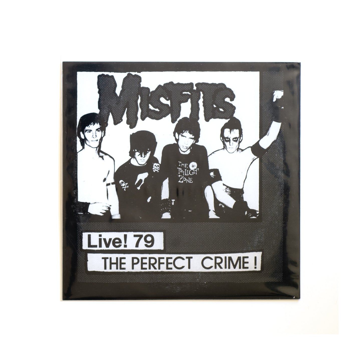 Misfits The Perfect Crime 7 inch featuring  high contrast image of the band. Bobby Steele, Glenn Danzig, Jerry Only,  and Joey Image.