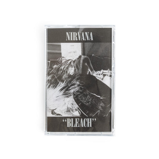 Nirvana Bleachcassette tape with 'Nirvana' and 'Bleach' on the cover against a black and white negative image of the band. 