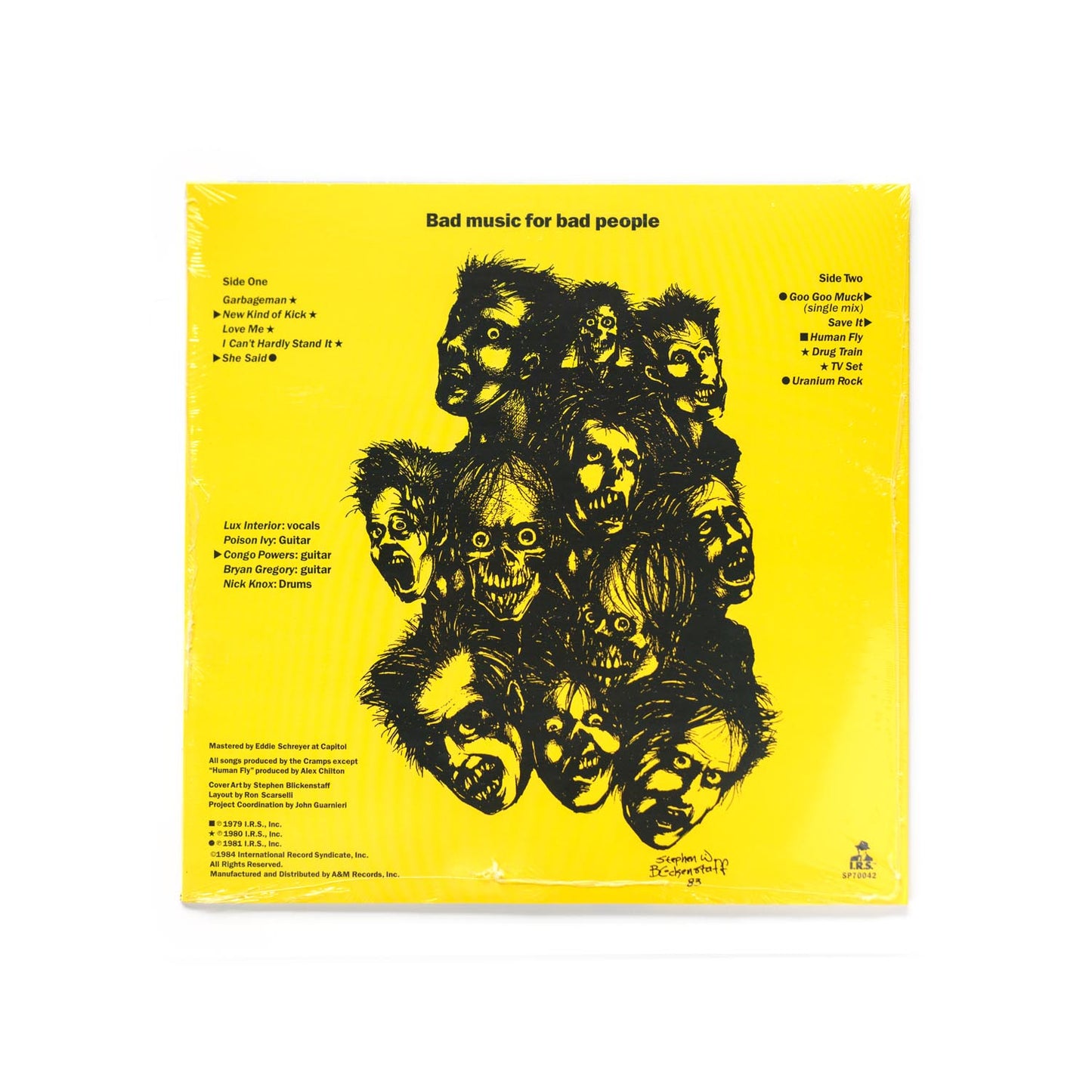 Back cover of Bad Music For Bad People by The Cramps, displaying tracklist and punk-style artwork in yellow and black, typical of the band’s raw visual aesthetic.