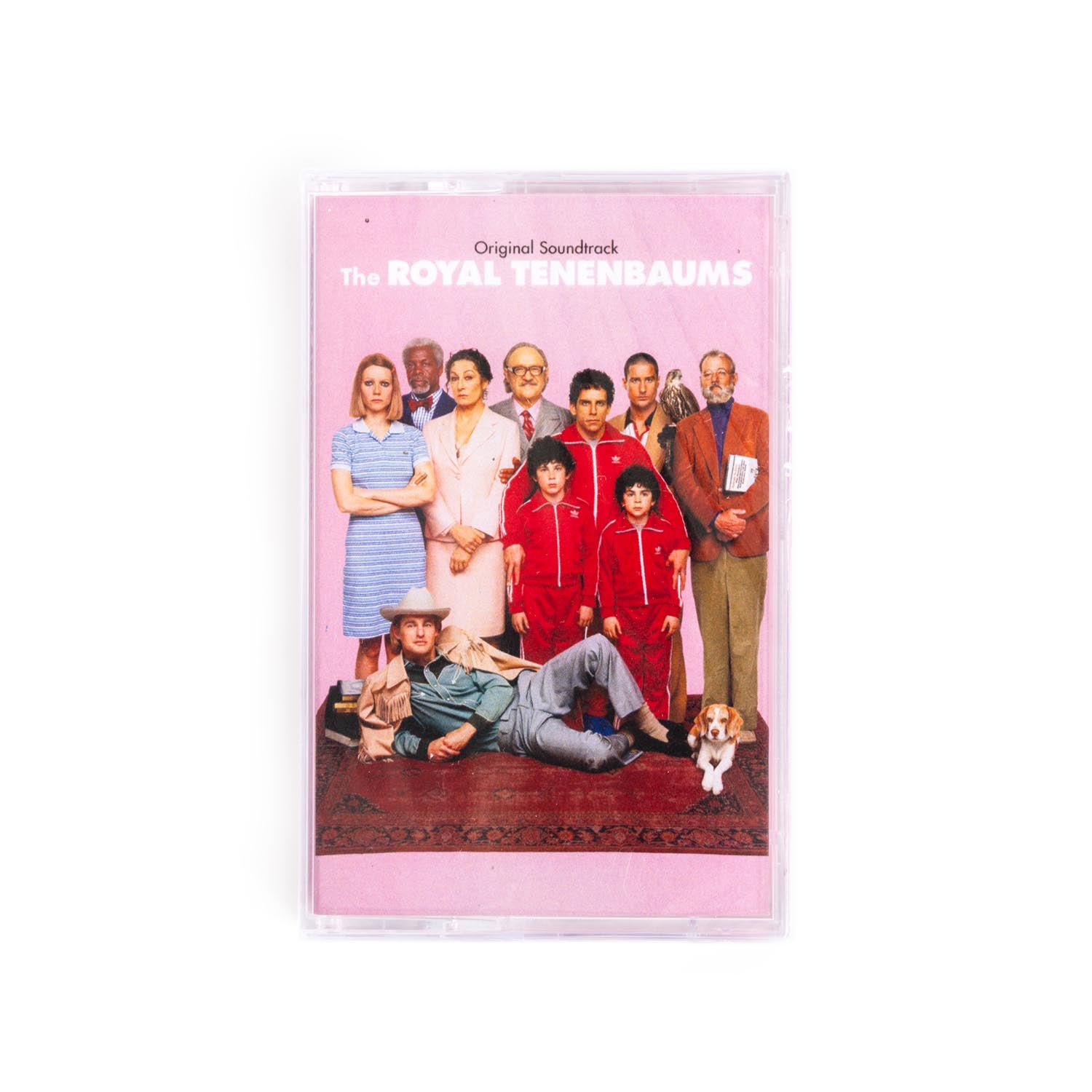 Cover of the Royal Tennenbaums cassette featuring a portrait of the actors from the film against a pink background. 