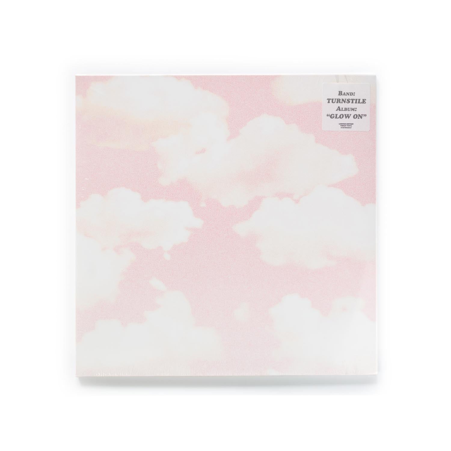 Turnstile Glow On album cover – grainy photo of clouds against a pink sky, 2023 violet vinyl reissue by Roadrunner Records